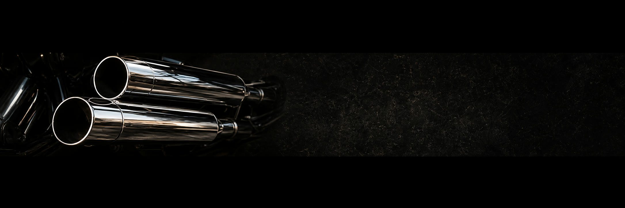 Polished black chrome motorcycle exhaust pipes